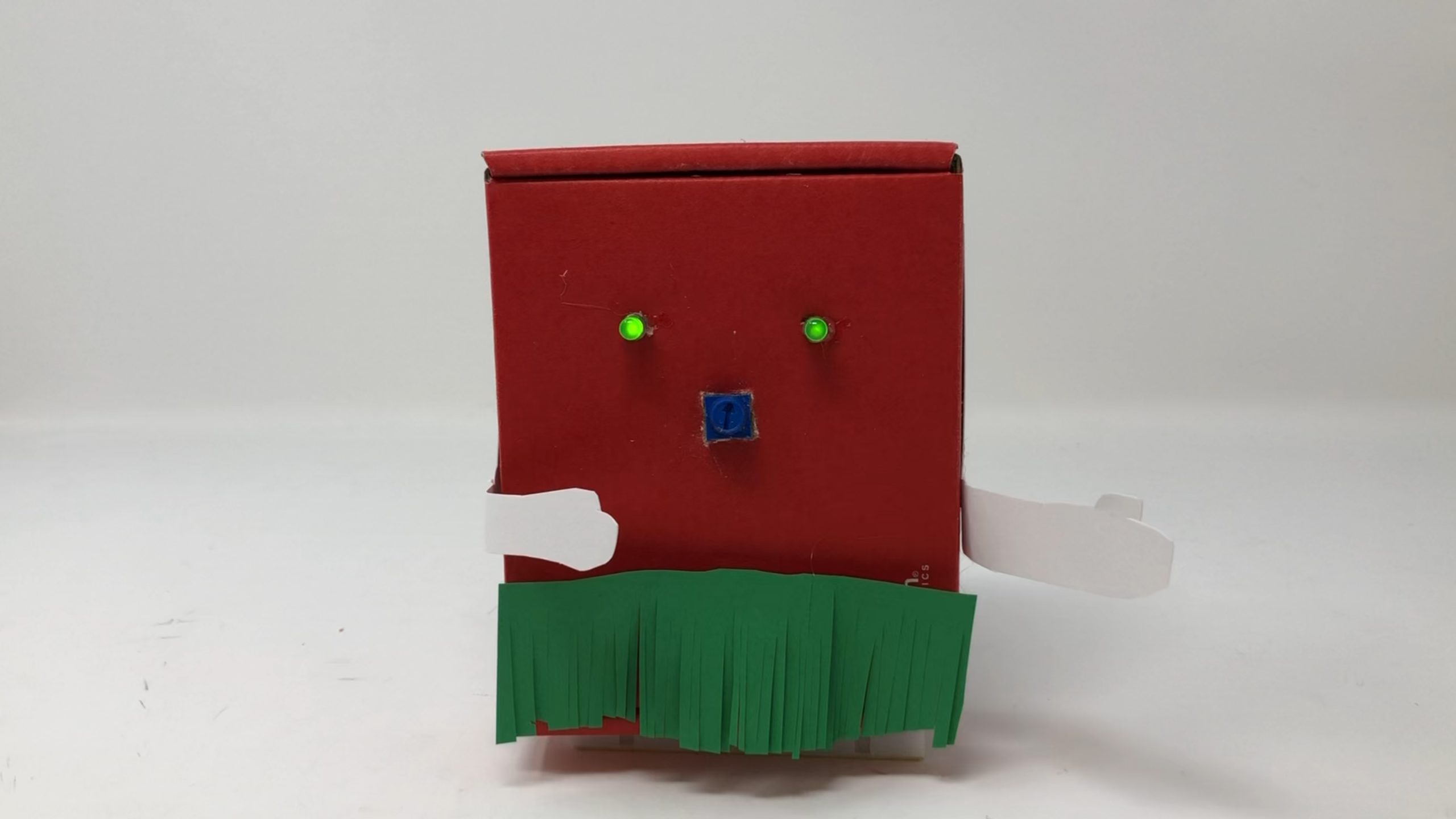 Header image showing red "hulabot" wearing a green paper skirt